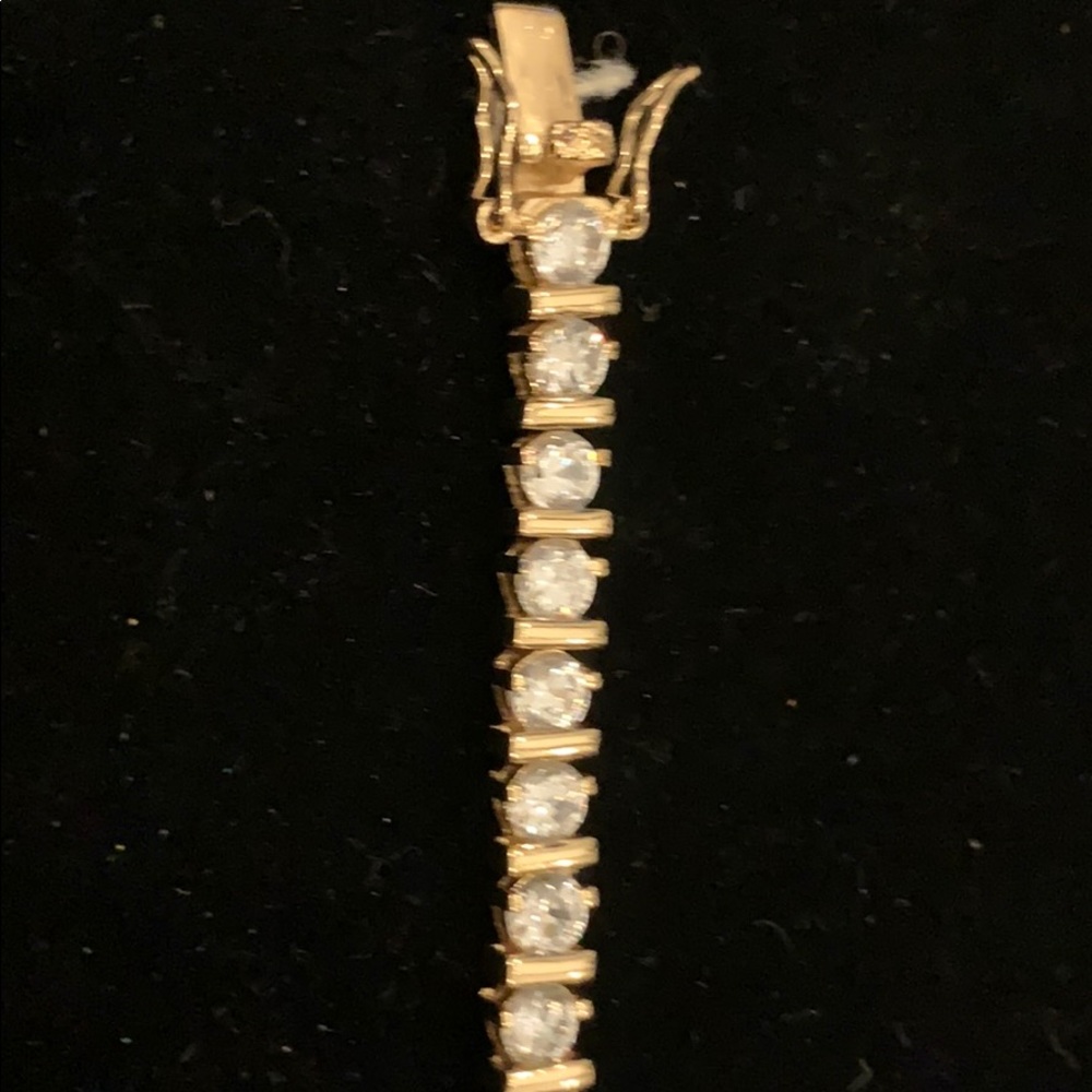 Gold and diamond tennis bracelet